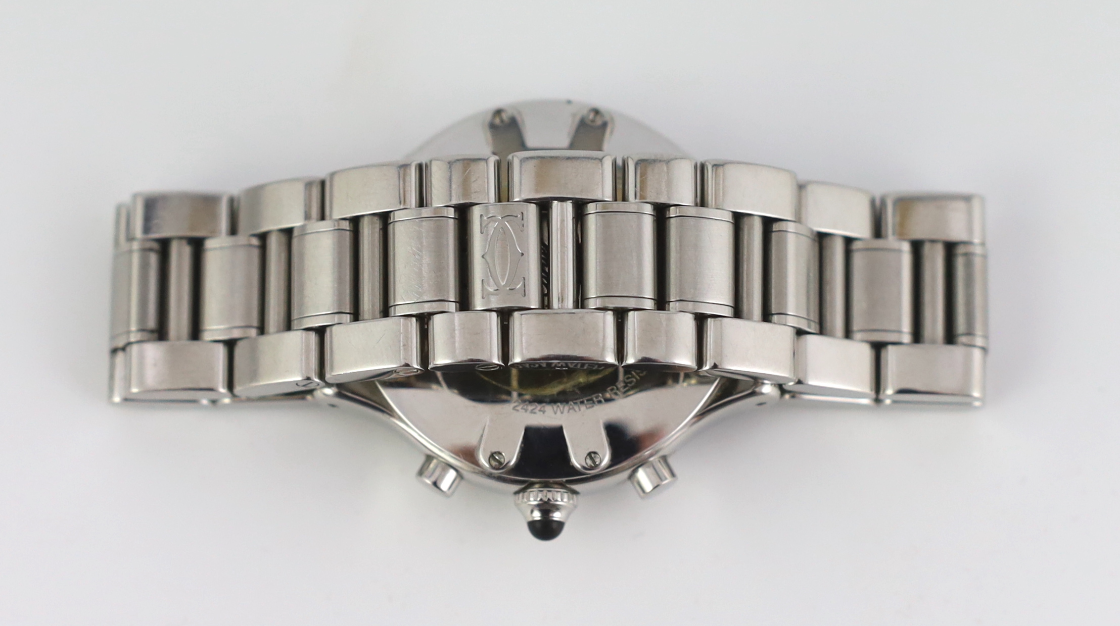 A gentleman's modern stainless steel Cartier 21 Chronograph quartz wrist watch, on a stainless steel Cartier bracelet